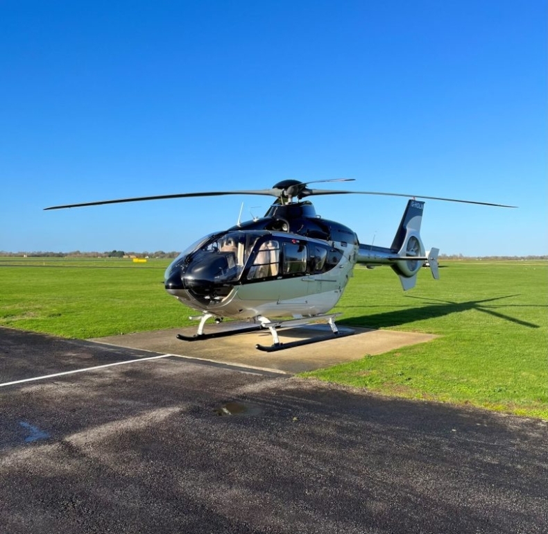 Ec135 t2 helicopter on heli pad